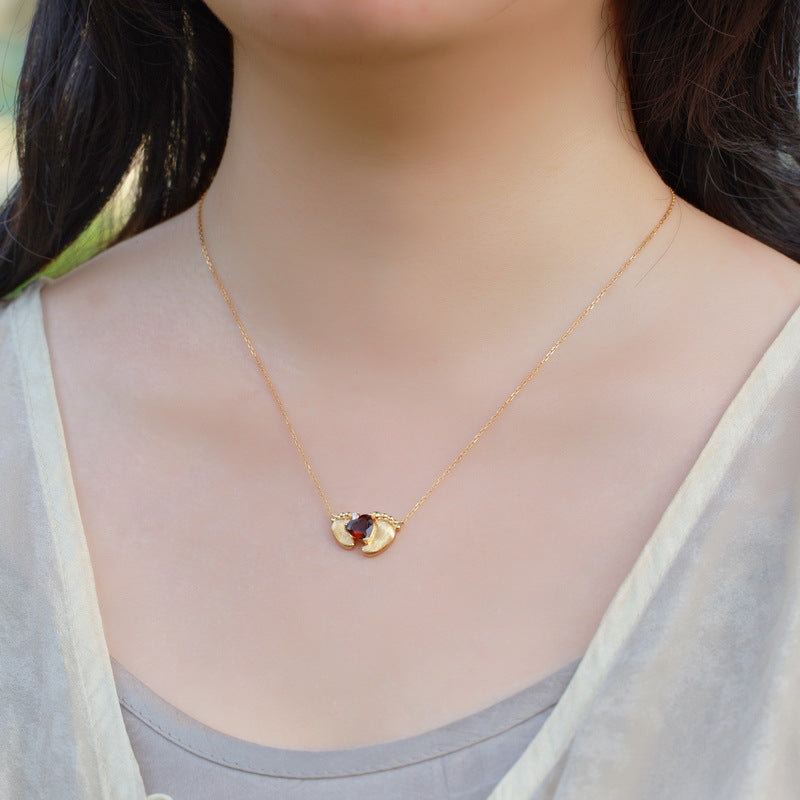 S925 sterling silver plated with 10K gold hand-brushed red garnet footprint necklace | Retro light luxury heart-shaped gem clavicle chain lucky commemorative jewelry