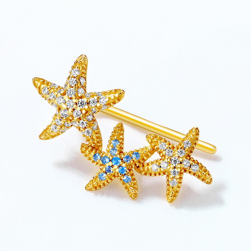 S925 sterling silver plated with 9K gold European and American style blue spinel white zircon starfish earrings can be worn sideways