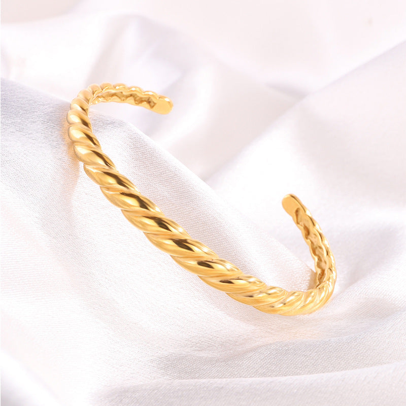 跨境簡約新款時尚氣質開口情侶手環高級小衆設計麻花不鏽鋼手鐲