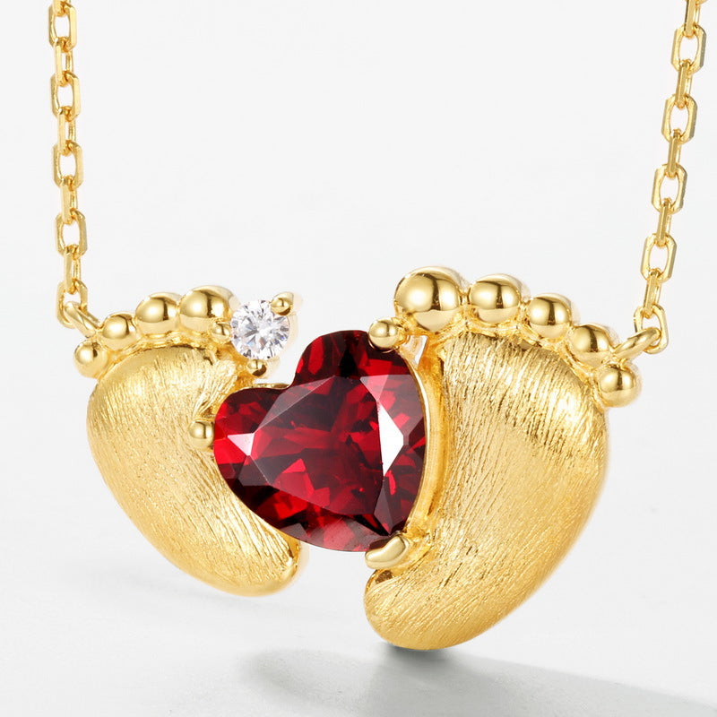 S925 sterling silver plated with 10K gold hand-brushed red garnet footprint necklace | Retro light luxury heart-shaped gem clavicle chain lucky commemorative jewelry