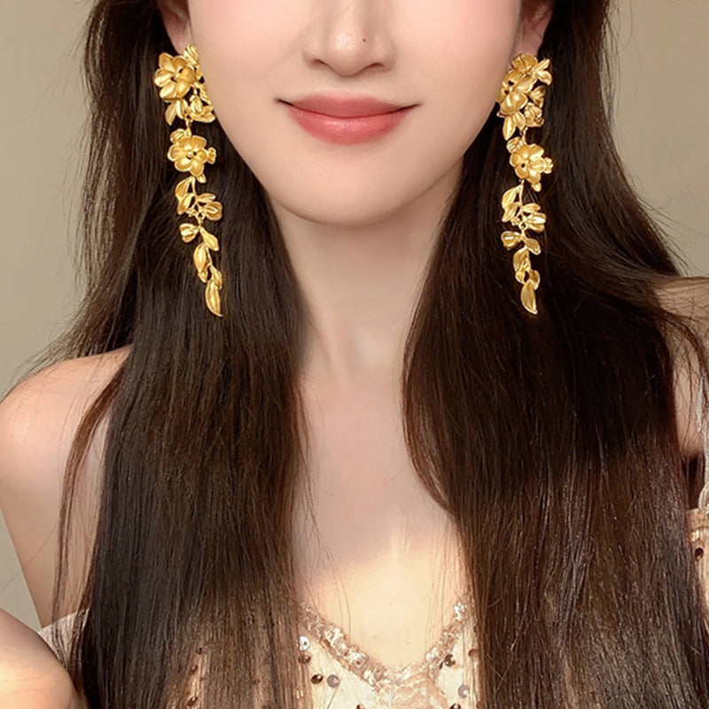 銀針歐美金屬風珍珠蝴蝶花朵流蘇耳釘小衆個性耳環時尚誇張耳飾女