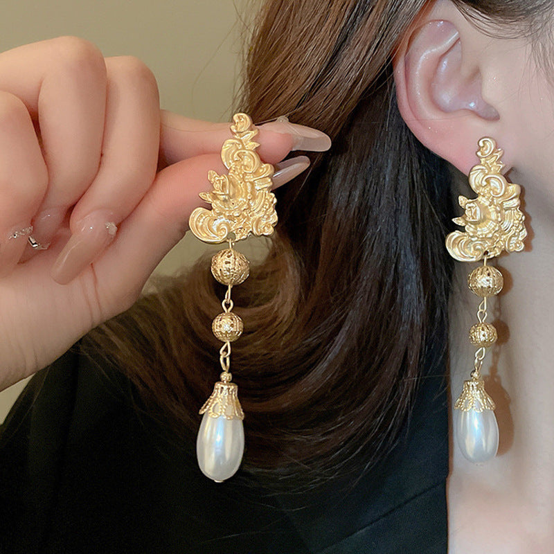 銀針歐美金屬風珍珠蝴蝶花朵流蘇耳釘小衆個性耳環時尚誇張耳飾女