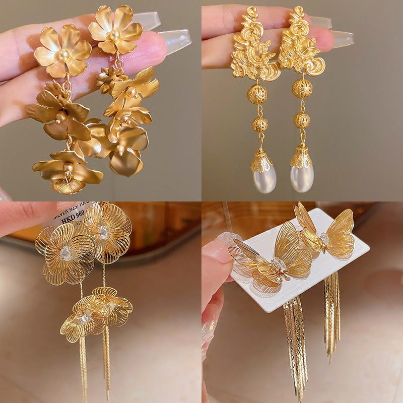 銀針歐美金屬風珍珠蝴蝶花朵流蘇耳釘小衆個性耳環時尚誇張耳飾女