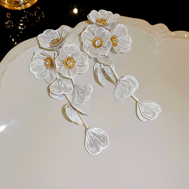 銀針歐美金屬風珍珠蝴蝶花朵流蘇耳釘小衆個性耳環時尚誇張耳飾女