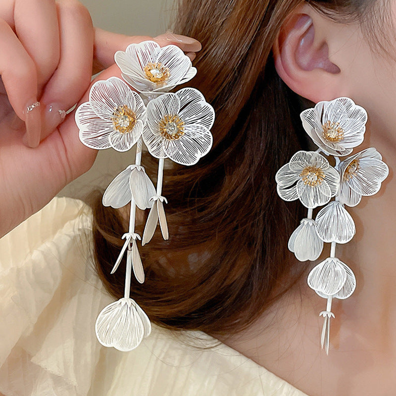 銀針歐美金屬風珍珠蝴蝶花朵流蘇耳釘小衆個性耳環時尚誇張耳飾女